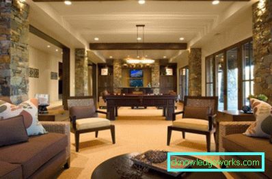 Photo: facing decorative stone columns in the interior of the living room